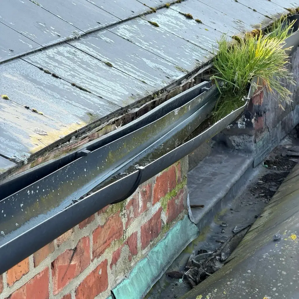 Gutter & downpipe checks by MJ roofing dublin